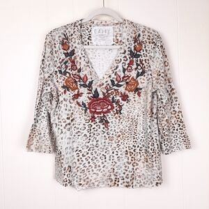 Caite embroidered top relaxed fit tee floral leopard boho chic artisanal artsy
